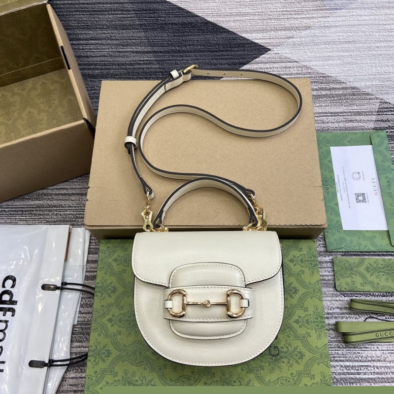 G*u*i top handle bags